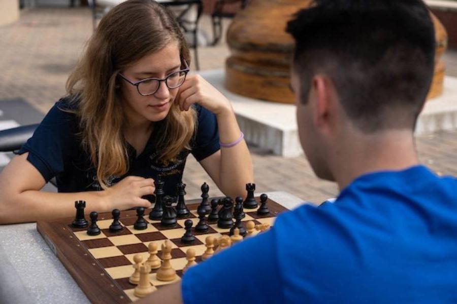 Members of the chess team battling it out in a game of chess